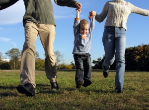 boy and parent's hands