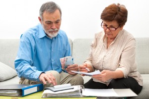 senior couple worrying about their money situation
